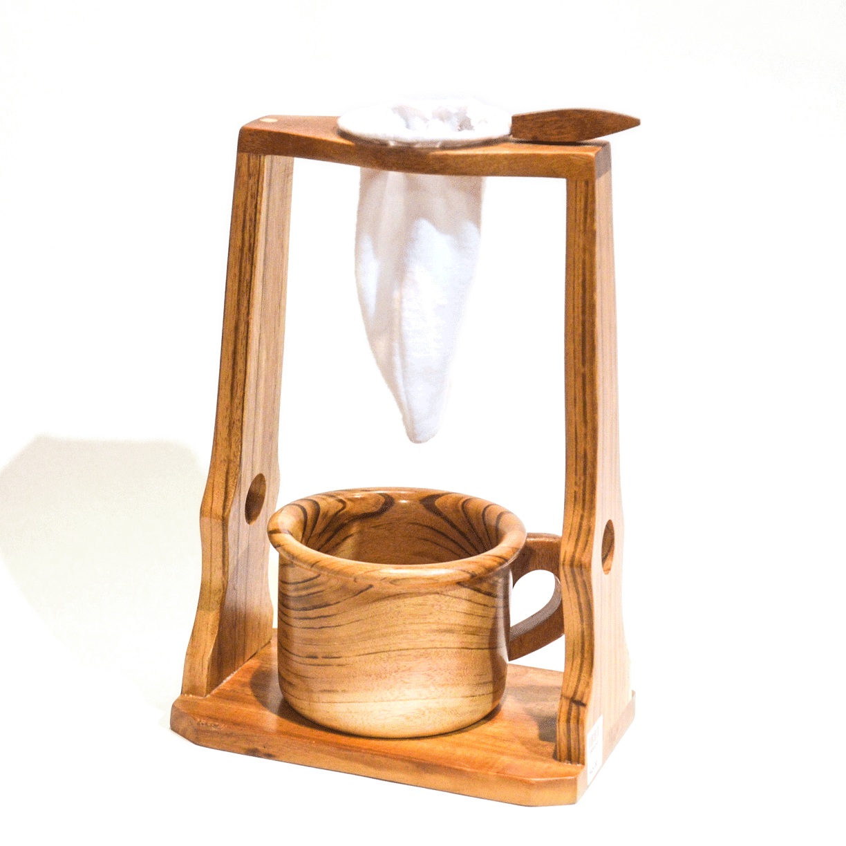 Wooden coffee brewer with mug and bag